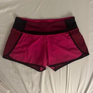 Lululemon 4 inch speed ups. Hot pink and black.